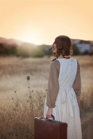 nostalgia, woman leaving homeの写真素材