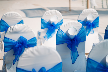 Wedding banquet chair cover in white and blueの写真素材