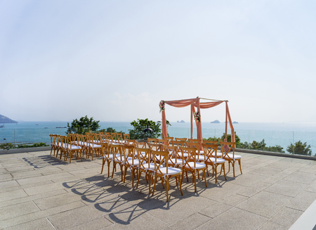 The beach wedding venue with 360 panoramic ocean view, The folding lawn guest chairs. Koh Samui, Thailand.の写真素材