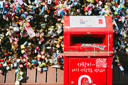 Seoul, South Korea - October 8, 2014: The close-up of a red post box of letter in the lock love key area at Namsan Tower (N-Seoul Tower)のeditorial素材