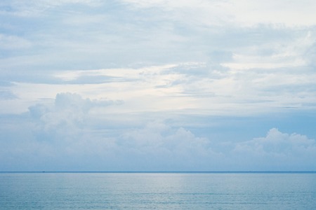 The beauty in nature, beautiful seascape with sea horizon against the light blue sky before sunset.の写真素材