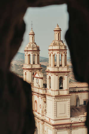 White ancient village on top of a mountain in Spain.の写真素材