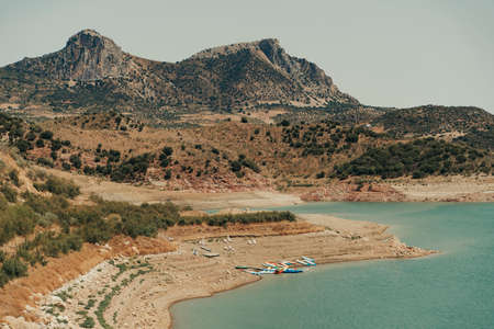 White ancient village on top of a mountain in Spain.の写真素材