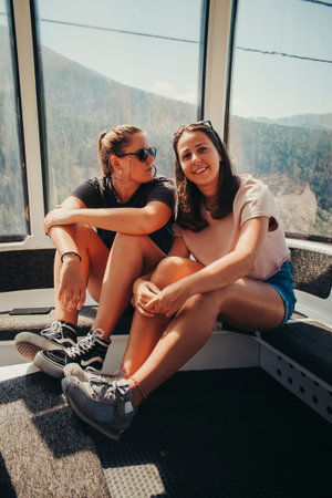 Happy 20-year-old girl on top of a mountain in Andorra.の写真素材