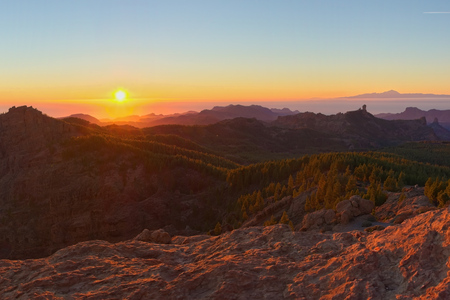 Romantic view from Pico de las Nieves at sunset with Teide in the backgroundの写真素材