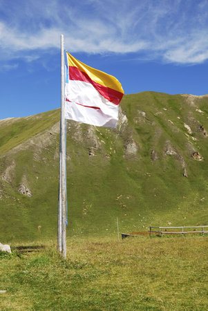 Flag of Austria seen in the alpsの写真素材