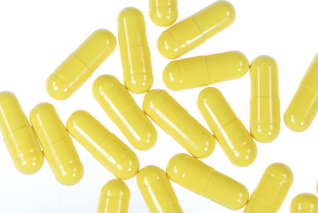 Lot of yellow medical capsules