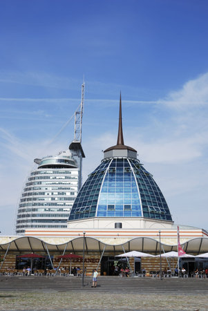 BREMERHAVEN, GERMANY - AUGUST 21: ATLANTIC Hotel SAIL City in Bremerhaven, Germany on August 21, 2011. Highest building of the city, with visitor platform, conference center and restaurant.  Built 2008 with the form of a sail. Foto taken from Van-Ronzelenのeditorial素材