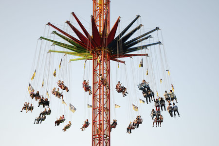 MUNICH, GERMANY - October 3: Chairoplane on the Oktoberfest in Munich, Germany on October 3, 2011. The Oktoberfest is the biggest beer festival of the world with over 6 million visitors each year.のeditorial素材