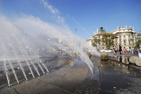 MUNICH, GERMANY - OCTOBER 4: Stachus fountain in Munich at the Karlsplatz on October 4, 2011. Munich is the biggest city of Bavaria with almost 100 million visitors a year. Foto taken from Sonnenstrasse with view to the Palace of Justice.のeditorial素材