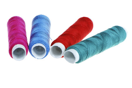 Macro of colorful yarn bobbins