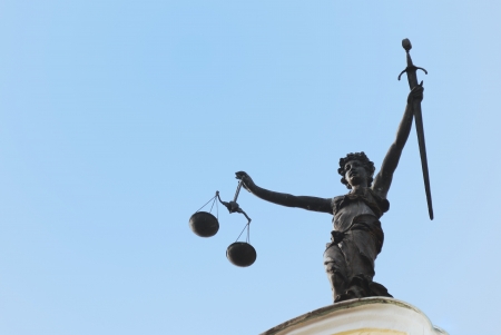 Statue of Lady Justice seen on the old town hall of Ingolstadtの写真素材