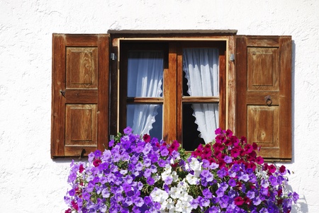 Rustic window with flower decorationの写真素材
