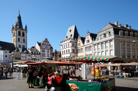 TRIER, GERMANY - SEPTEMBER 4. Tourists at the Hauptmarkt in Trier, Germany on September 4, 2013. This market square from the 10th century is one of the most picturesque ones of Germany. Foto taken on the Hauptmarkt.のeditorial素材