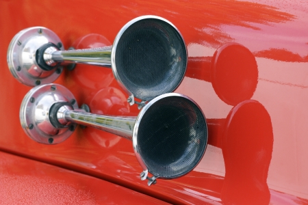 Signal horn of a red vintage fire truckの写真素材