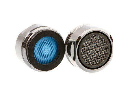 Two Isolated faucet aerators for saving water.の写真素材
