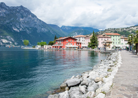 TORBOLE, ITALY - APRIL 22: The village of Torbole, Italy on April 22, 2014. The town is located at Lake Garda, the biggest lake of Italy, which is popular for windsurfing. Foto taken from Via Conca D' Oroのeditorial素材