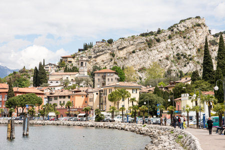 TORBOLE, ITALY - APRIL 22: The village of Torbole. Italy on April 22, 2014. The town is located at Lake Garda, the biggest lake of Italy, which is popular for windsurfing. Foto taken from Via Conca D' Oroのeditorial素材