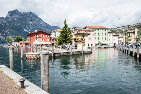 TORBOLE, ITALY - APRIL 22: The village of Torbole, Italy on April 22, 2014. The town is located at Lake Garda, the biggest lake of Italy, which is popular for windsurfing. Foto taken from Via Conca D' Oroのeditorial素材