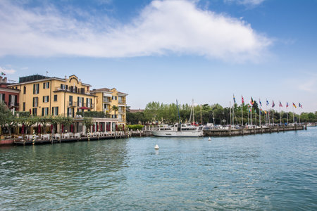 SIRMIONE, ITALY - APRIL 23: The hotel Sirmione in Sirmione, Italy on April 23, 2014. The village is a very popular tourist destination at Lake Garda. Foto taken from Piazza Catello.のeditorial素材