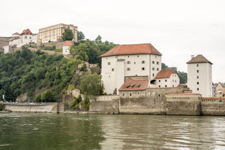 PASSAU, GERMANY - AUGUST 23: Veste Niederhaus castle at the Danube river in Passau, Germany on August 23, 2014. Passau is also called the City of Three Rivers (Danube, Ilz and Inn). Foto taken from Donaukai.のeditorial素材