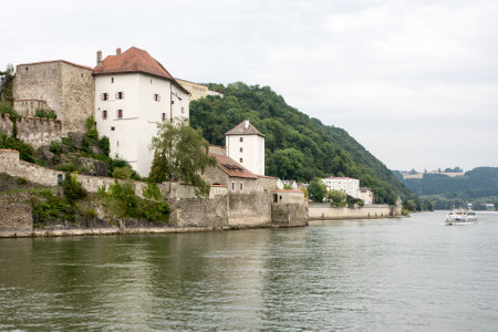 PASSAU, GERMANY - AUGUST 23: Veste Niederhaus castle at the Danube river in Passau, Germany on August 23, 2014. Passau is also called the City of Three Rivers (Danube, Ilz and Inn). Foto taken from Donaukai.のeditorial素材