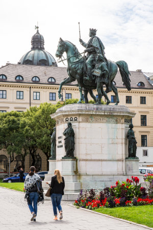 MUNICH, GERMANY - AUGUST 25: Tourists at the Monument of King Ludwig I in Munich, Germany on August 25, 2014. Munich is the biggest city of Bavaria with almost 100 million visitors a year. Foto taken from Odeonsplatz.のeditorial素材