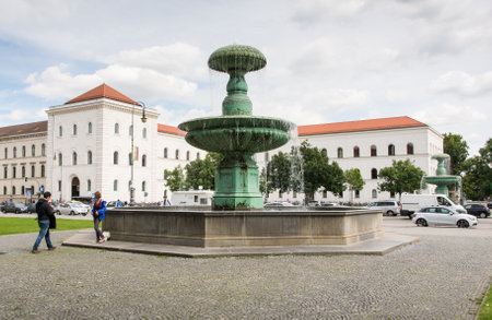 MUNICH, GERMANY - AUGUST 25: Tourists at the Ludwig Maximilian University of Munich, Germany on August 25, 2014. The university is among  the oldest universities of Germany. Foto taken from Geschwister Scholl Platz.のeditorial素材