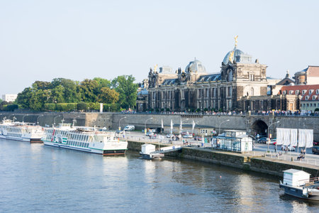 DRESDEN, GERMANY - SEPTEMBER 4: Tourists at the promenade of the river Elbe in Dresden, Germany on September 4, 2014. Dresden has almost 2 million visitors a year. Foto taken from Augustus bridge.のeditorial素材