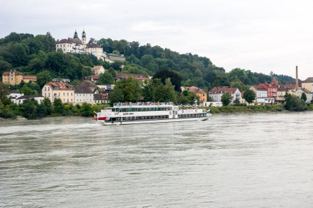 PASSAU, GERMANY - AUGUST 23: Passenger ship on the river Inn in Passau, Germany on August 23, 2014. Passau is also called the City of Three Rivers (Danube, Ilz and Inn). Foto taken from Innkai.のeditorial素材