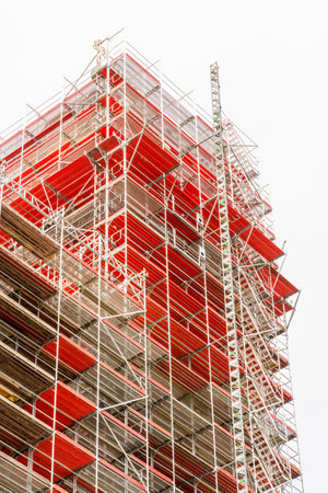 Construction site with a scaffold at the facade of a high houseのeditorial素材