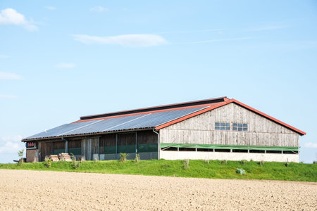 Modern barn with photovoltaic installation on the roof.のeditorial素材