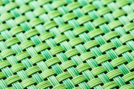 Macro of an abstract table mat background with shallow depth of field