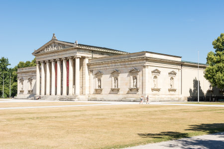 MUNICH, GERMANY - AUGUST 3: Tourits at the Koenigsplatz in Munich, Germany on August 3, 2015. During the third reich the square was used for Nazi parties. Foto taken from Koenigsplatz with view to the Glyptothek.のeditorial素材