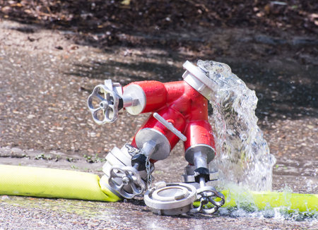 Water splashing out of a valve for a firehose