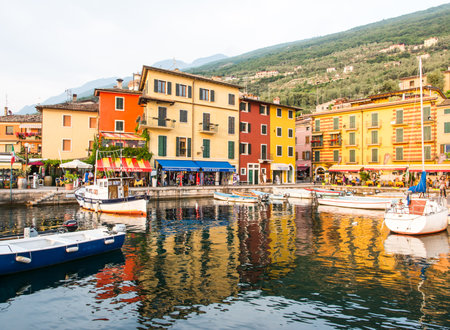 CASTELLETTO, ITALY - MAY 31: Port in Lake Garda at Castelletto, Italy on May 31, 2015. Lake Garda is one of the most frequented tourist regions of Italy. Foto taken from the port with view to the village.のeditorial素材