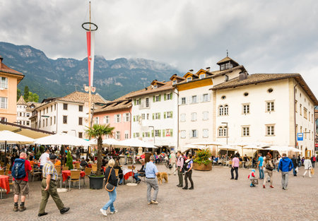 KALTERN, ITALY - SEPTEMBER 22: People at the market square of Kaltern, Italy on September 22, 2015. Kaltern is famous for its viniculture. Foto taken from Piazza Principale.のeditorial素材