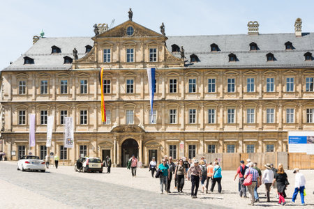 BAMBERG, GERMANY - MAI 6: Tourists at Neue Residenz in Bamberg, Germany on Mai 6, 2016. The Neue Residenz was the former residence of the bishops of Bamberg. Foto taken from Domplatz with view to the residence.のeditorial素材