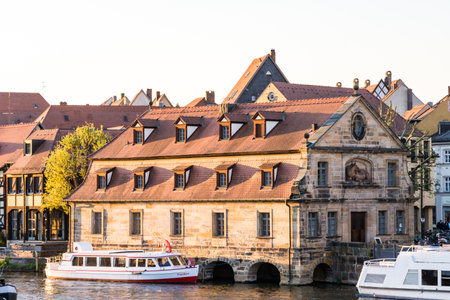BAMBERG, GERMANY - MAI 7: Passenger ship at river Regnitz in Bamberg, Germany on Mai 7, 2016.  Foto taken from Am Leinritt with view to Am Kranen.のeditorial素材