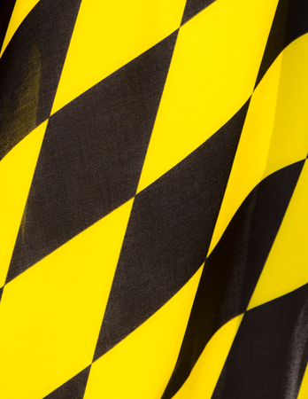 Background of the black and yelow flag of Munichの写真素材
