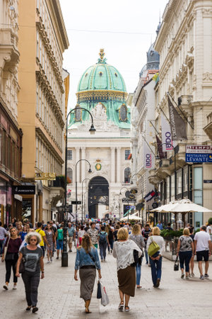 VIENNA, AUSTRIA - AUGUST 28: Tourists at the pedestrian area with view to the famous imperial Hofburg palace in Vienna, Austria on August 28, 2017.のeditorial素材