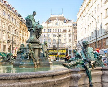 VIENNA, AUSTRIA - AUGUST 30: People at the Donnerbrunnen fountain at Neuer Markt square  in Vienna, Austria on August 30, 2017.のeditorial素材