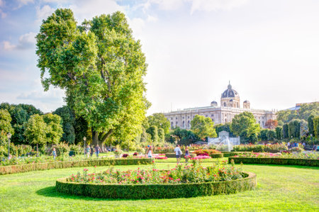 VIENNA, AUSTRIA - AUGUST 28: People in the public Voksgarte park of Vienn Vienna, Austria on August 28, 2017. View to the natural history museum.のeditorial素材