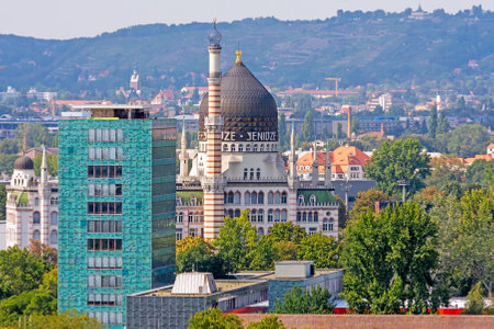 DRESDEN, GERMANY - AUGUST 22: The  Yenidze building in Dresden, Germany on August 22, 2018. Yenidze is the name of a former cigarette factory building  which borrows design elements from mosques. Foto taken from Kreuzkirche tower.のeditorial素材