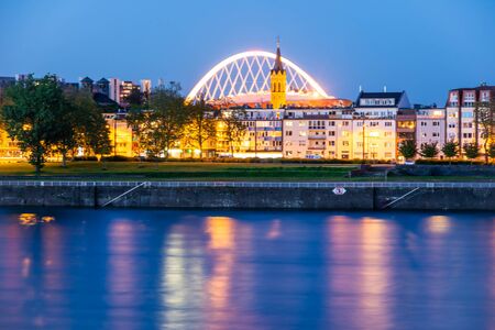 Riverside of the river Rhine in Cologne (Germany) at nightの写真素材