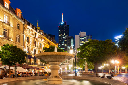 FRANKFURT, GERMANY - SEPTEMBER 16: Fountain at night in the city of Frankfurt, Germany on September 16, 2019.  Foto taken from Opernplatzのeditorial素材