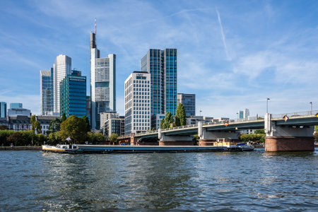 FRANKFURT, GERMANY - SEPTEMBER 15: Barge on the Main river in Frankfurt , Germany on September 15, 2019. Foto taken from Schaumainkai with view to skyline of Frankfurt.のeditorial素材