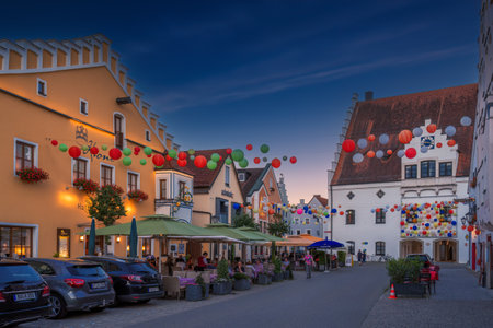 BEILNGRIES, GERMANY - JULY 5: Restaurant at night at the historic market square in Beilngries, Germany on July 5, 2022.のeditorial素材
