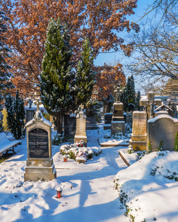 SCHROBENHAUSEN, GERMANY - DECEMBER 17: Snow in the landmarked historic cemetery in Schrobenhausen, Germany on December 17, 2022のeditorial素材