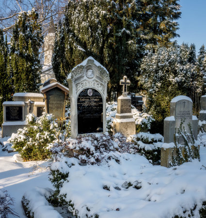 SCHROBENHAUSEN, GERMANY - DECEMBER 17: Snow in the landmarked historic cemetery in Schrobenhausen, Germany on December 17, 2022のeditorial素材